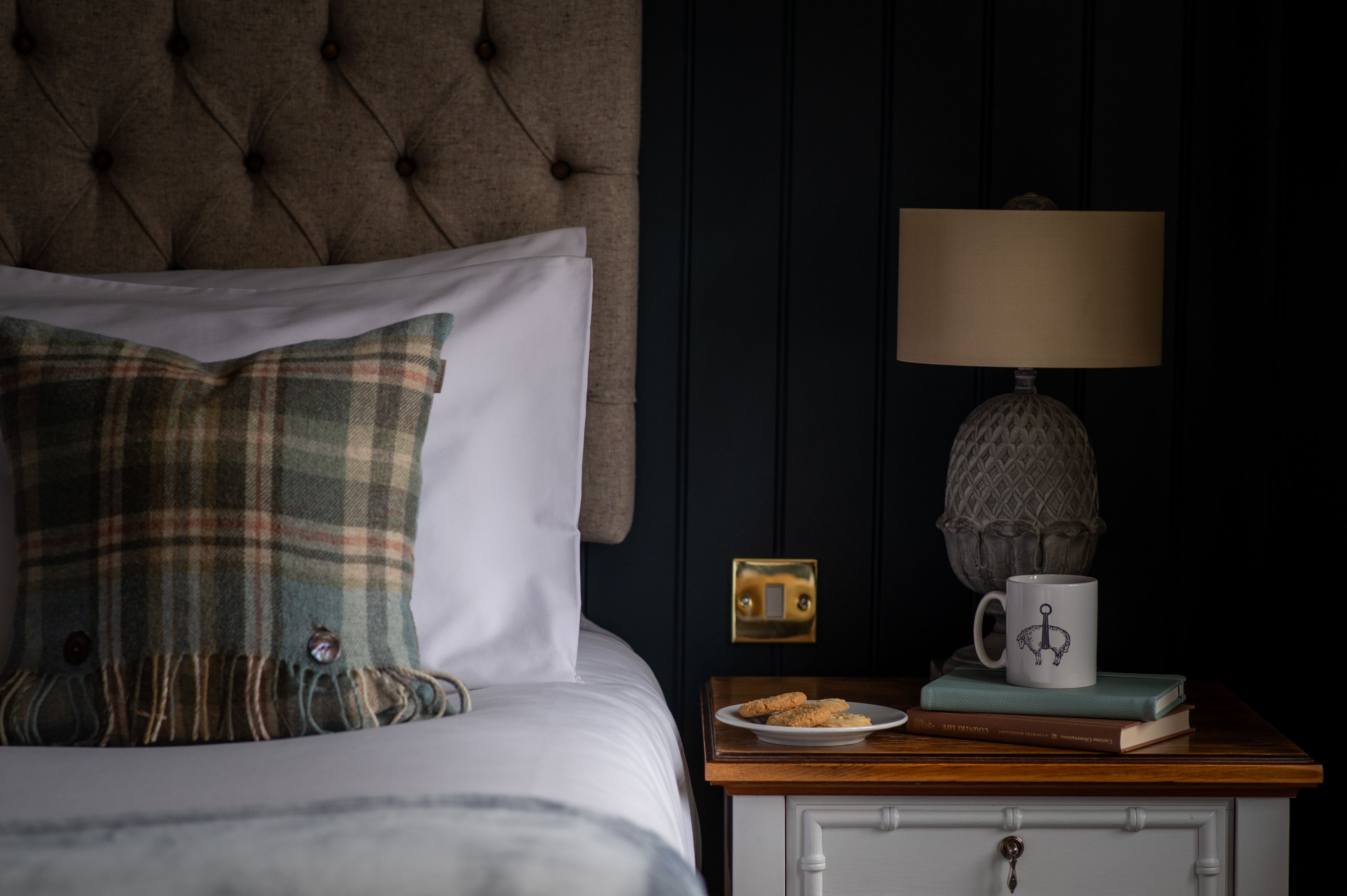 bed side table with biscuits and coffee